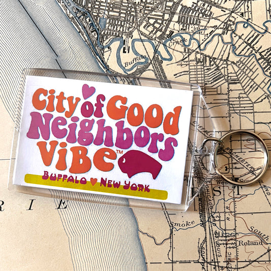 “City of Good Neighbors Vibe™” keychain